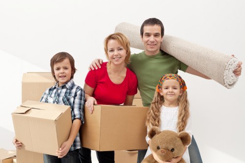 Kensington moving team organizing boxes and furniture for transport