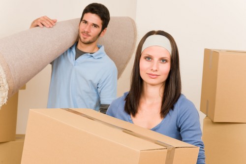 Student preparing boxes for a removals service in Kensington